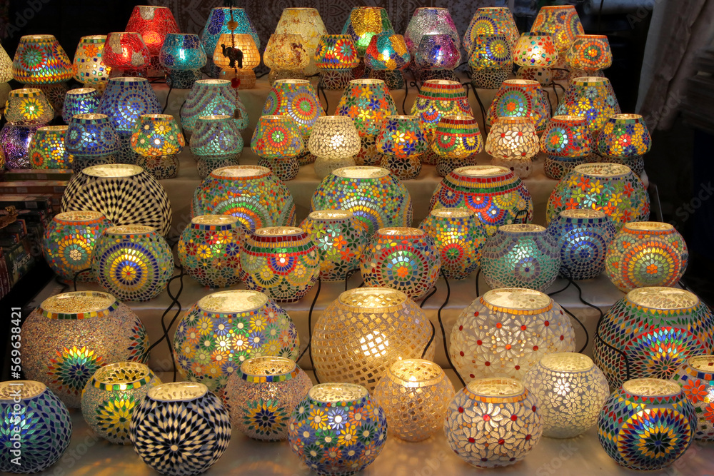 Table lamps decorated with mosaics of various colors for sale in a street market