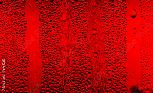Ice cold glass fresh coca cola covered with water drops condensation Cold drink Drops of water cola drink background Raindrops texture Close up