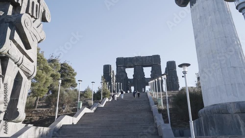 Huge stone statues. Action. Tourist old places made of white stones taken in good summer weather. photo