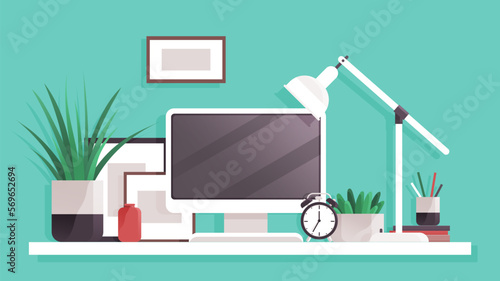 Workspace. Online or home job workplace. Work place room, modern interior, cabinet. Work at home. Office with computer and various decorative items books and plants. Desktop computer monitor