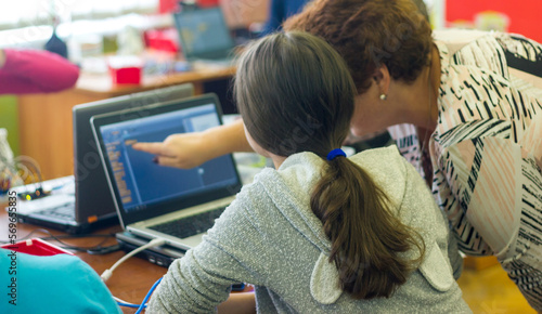 girl working on laptop and study programming