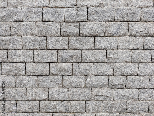 Wall, wall or façade covered with rustic stone tiles such as granite or , well aligned, preserving the natural appearance of each piece, ideal for decorating external and internal areas.
