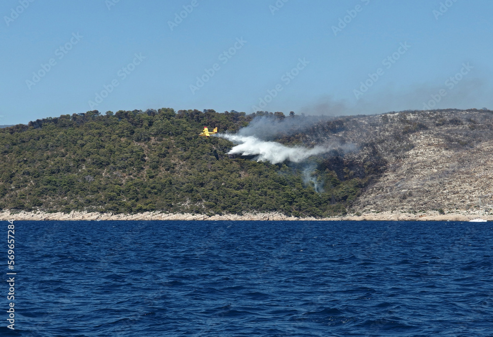Fire fighting airplane in action, Hvar Island, Croatia