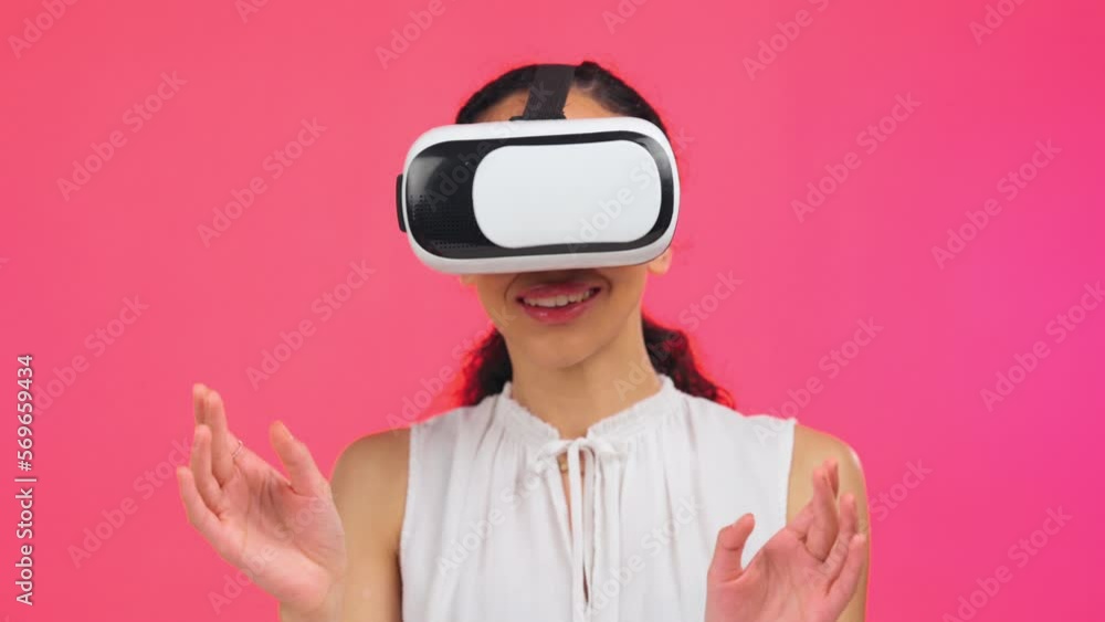 Black woman, studio background and vr glasses for future 3D gaming ux with hands, smile and software. Young gen z model, gamer girl and augmented reality tech for futuristic ui, iot or metaverse game Black woman, studio background and vr glasses for future 3D gaming ux with hands, smile and software. Young gen z model, gamer girl and augmented reality tech for futuristic ui, iot or metaverse game