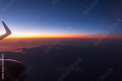 Wallpaper Mural Amazing night sky after sunset from airplane porthole. Air travel Torontodigital.ca