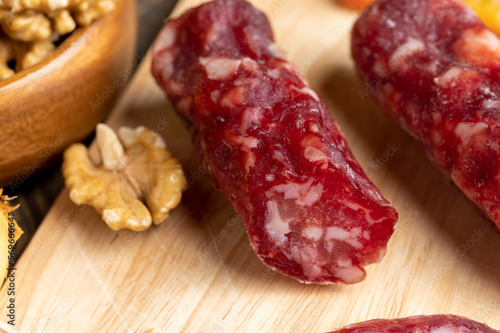 sliced sausage from pieces of meat with bacon sliced sausage from pieces of meat with bacon