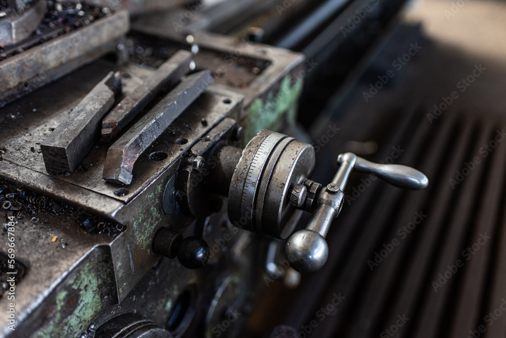 Old equipment, machines, tools in an abandoned mechanical factory Old equipment, machines, tools in an abandoned mechanical factory