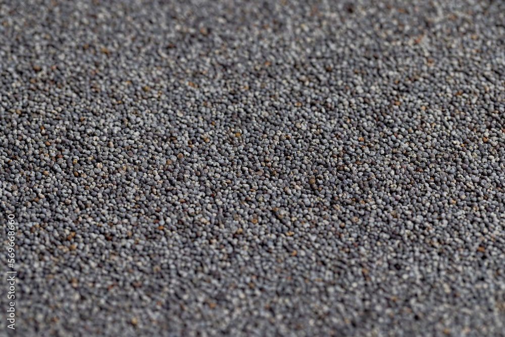 Poppy seeds on the table close up Poppy seeds on the table close up