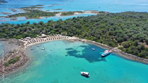 Aerial drone photo of Mediterranean paradise destination island complex with sandy organised beaches and turquoise clear sea © aerial-drone