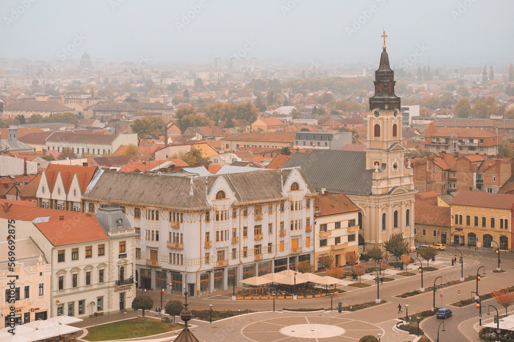 Discover the beauty of Oradea, Romania with this stunning cityscape photo. The towering buildings and bustling city center create a dynamic scene that is perfect for businesses and tourism industries
