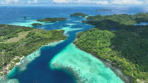 A narrow channel leads to a remote, scenic lagoon in the Solomon Islands. This beautiful, tropical country is home to spectacular marine biodiversity and many historic World War II sites.