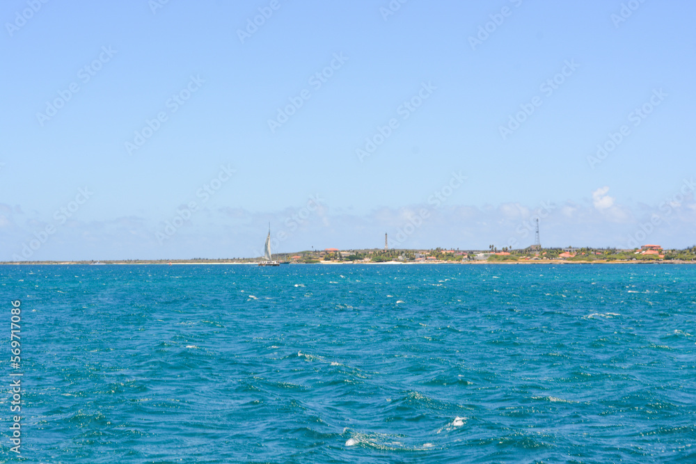 A beautiful coastal view on Aruba island from Caribbean sea. Space for text. 
