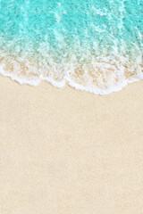 Soft ocean wave on white sand beach background