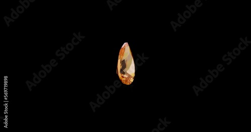 Orange sapphire pear cut gemstone  black background