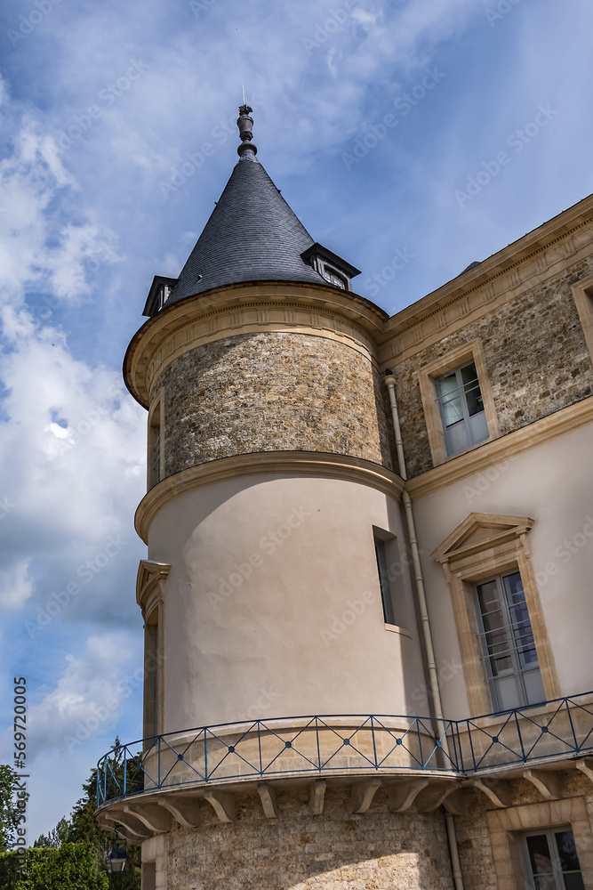 Fototapeta premium Fragments of Chateau de Rambouillet (Castle of Rambouillet, XIV century) in picturesque Public Park in town of Rambouillet. Yvelines department, Ile-de-France region, 50 km southwest of Paris. France.