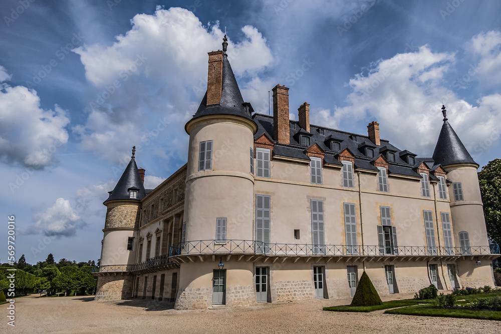 Fragments of Chateau de Rambouillet (Castle of Rambouillet, XIV century) in picturesque Public Park in town of Rambouillet. Yvelines department, Ile-de-France region, 50 km southwest of Paris. France.