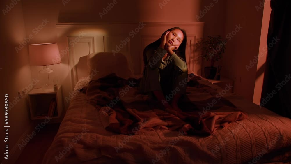 Depressed Asian woman cannot sleep insomnia suffering from insomnia lying in bed Depressed Asian woman cannot sleep insomnia suffering from insomnia lying in bed