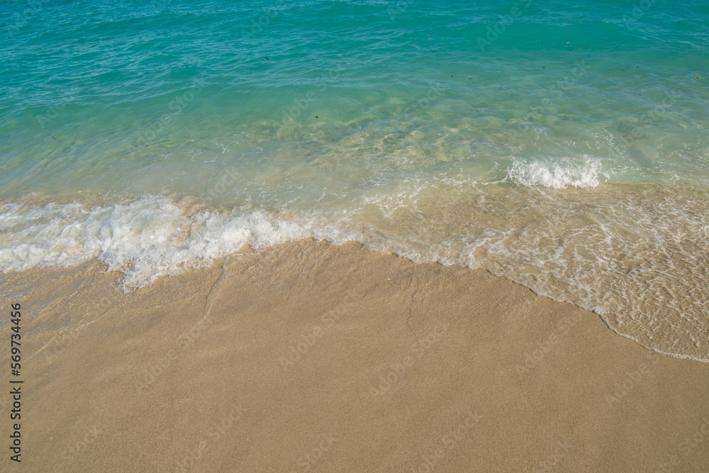 Beautiful Soft blue ocean wave on fine sandy beach. Blue ocean waves aerial drone shot on sandy beach. Beautiful Soft blue ocean wave on fine sandy beach. Blue ocean waves aerial drone shot on sandy beach.