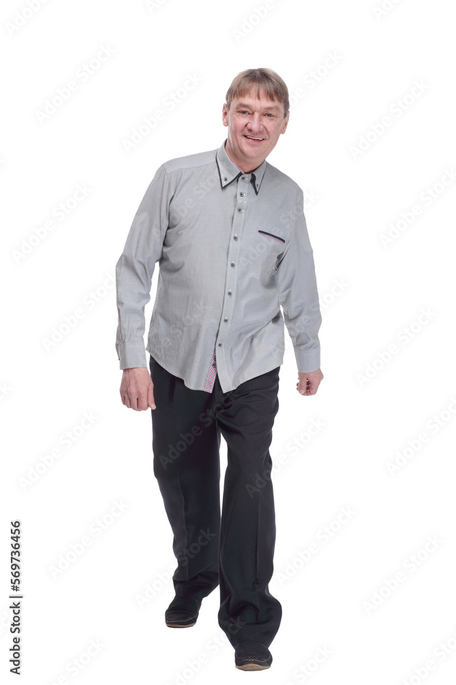happy mature man in white shirt striding forward. happy mature man in white shirt striding forward.