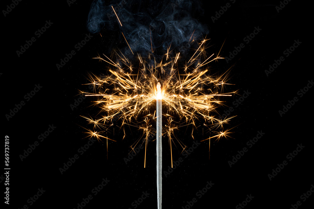 The brilliant spark produced when a firework stick is lit The brilliant spark produced when a firework stick is lit