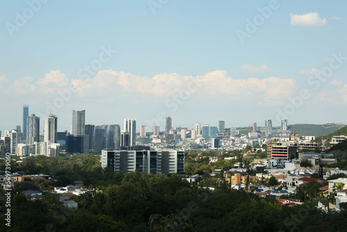 Picturesque view of city and green trees © New Africa