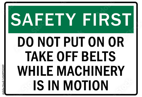 Safety equipment sign and labels do not put on or take off belts while machinery is in motion