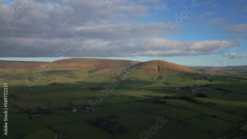 Rolling hills with sunshine and cloud shadows at the Trough of Bowland photo