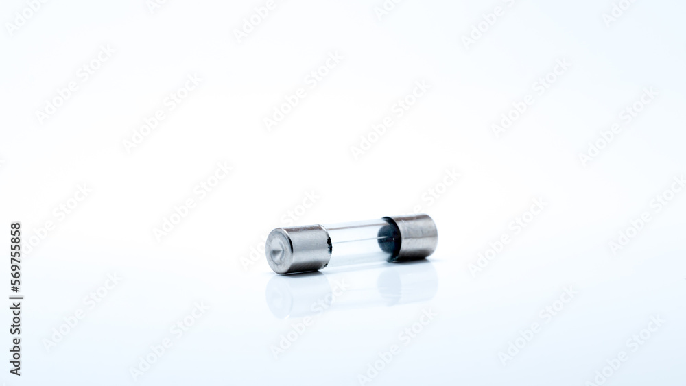 macro photo of mini fuse to prevent short circuit isolated on white background macro photo of mini fuse to prevent short circuit isolated on white background