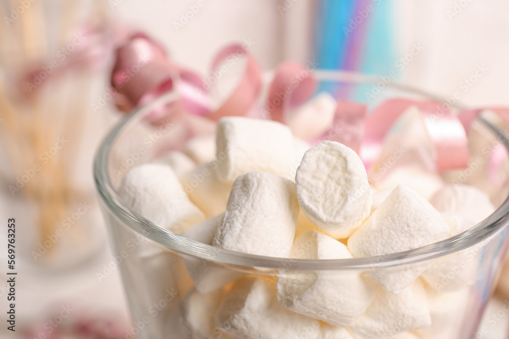 Glass with sweet marshmallows, closeup Glass with sweet marshmallows, closeup