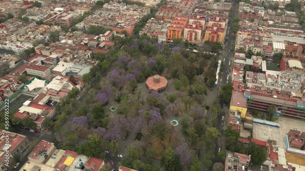 Kiosco Morisco (Morisco Kiosk) de Santa María la Ribera. Mexico City, Mexico. Aerial Drone footage. Rotating right to left. Daytime. Kiosco Morisco (Morisco Kiosk) de Santa María la Ribera. Mexico City, Mexico. Aerial Drone footage. Rotating right to left. Daytime.