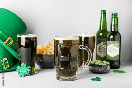 Glasses of beer, paper clov...