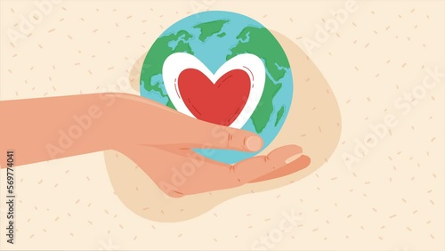 hand lifting heart and earth planet