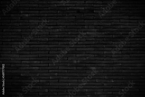 Abstract black brick wall texture for pattern background.