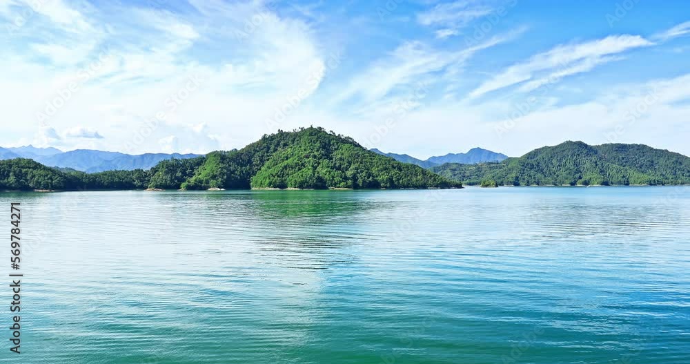 Beautiful lake and green mountain natural scenery in Thousand Island Lake, Hangzhou, Zhejiang Province, China.