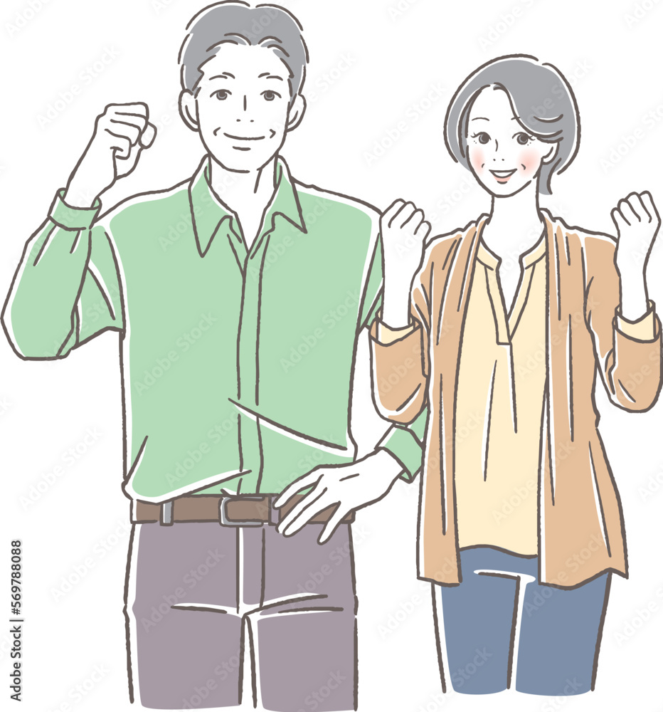 ガッツポーズをするシニアの男女 ガッツポーズをするシニアの男女