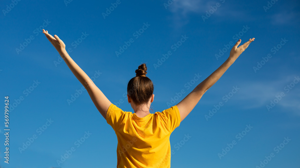 Happy joyful positive girl, young beautiful feeling carefree woman is enjoying vacation at summer sunny day, sunbathing, tanning and smiling. Happiness, freedom concept on sky natural background Happy joyful positive girl, young beautiful feeling carefree woman is enjoying vacation at summer sunny day, sunbathing, tanning and smiling. Happiness, freedom concept on sky natural background