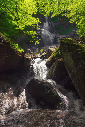 Tourists at the Halit waterfall in Azerbaijan photo