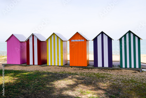 La Bree-les-Bains village bathing wooden cabin colors houses changing room on sand beach france © OceanProd
