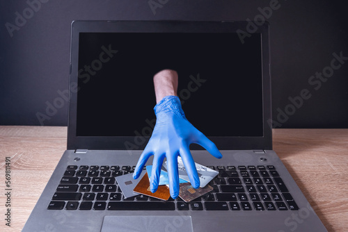 Cybercrime. Theft of money through online services. Unprotected computer from cyber attacks.