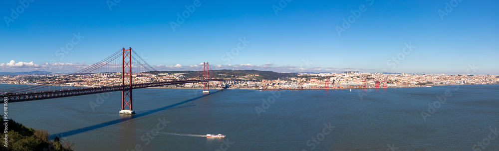 Landscape of the April 25 bridge over the Tagus river and the Lisbon  city  in the background