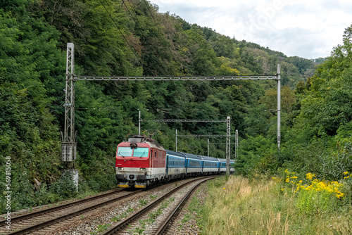 Slovakian electric locomotive puliing international EuroCity train in Czech Republic