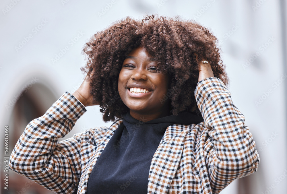 Black woman, portrait smile and afro hairstyle for fashion in city travel, trip or outdoor journey. Happy African American female touching stylish curls and smiling in happiness for traveling in town Black woman, portrait smile and afro hairstyle for fashion in city travel, trip or outdoor journey. Happy African American female touching stylish curls and smiling in happiness for traveling in town