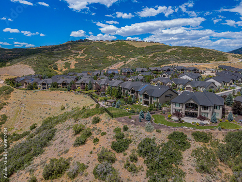 Wallpaper Mural Aerial view of a small neighborhood on a mountain at Draoer, Utah. Villas in a subdivision on mountain slopes against the vivid sky background. Torontodigital.ca