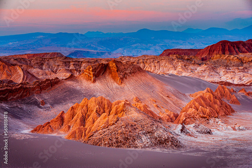 Sunset over the colorful badlands in the Moon Valley  Valle de la Luna  in the arid Atacama desert in the north of Chile