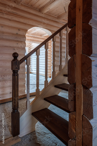 Wooden stairs in a wooden house. Architecture and design.
