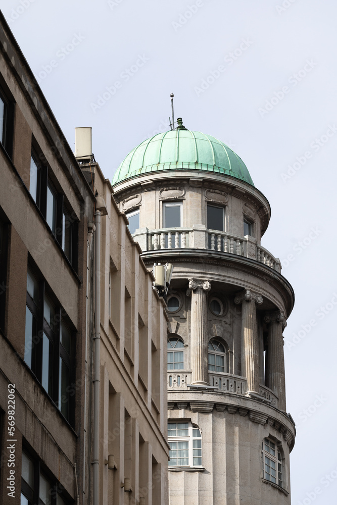 Neoclassical tower with a green dome. Architectural details of the building in Istanbul. Neoclassical tower with a green dome. Architectural details of the building in Istanbul.