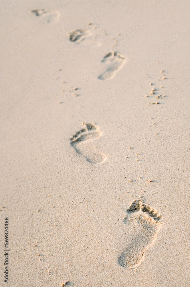 Footprints in sand on the beach, Koh Lipe, Thailand Footprints in sand on the beach, Koh Lipe, Thailand