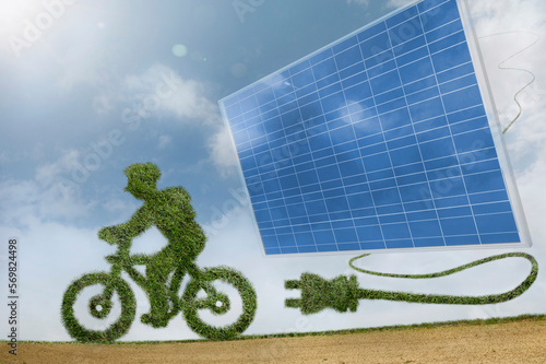Eco friendly green bicycle just unplugged from a green energy source solar panels, Bavaria, Germany photo