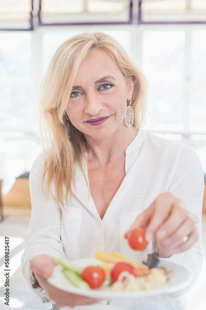 Portrait of woman having breakfast at hotel Portrait of woman having breakfast at hotel