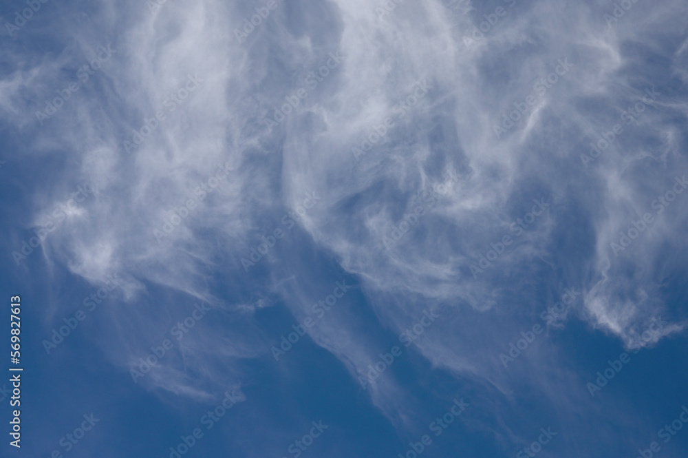 Windy Clouds In A Blue Sky